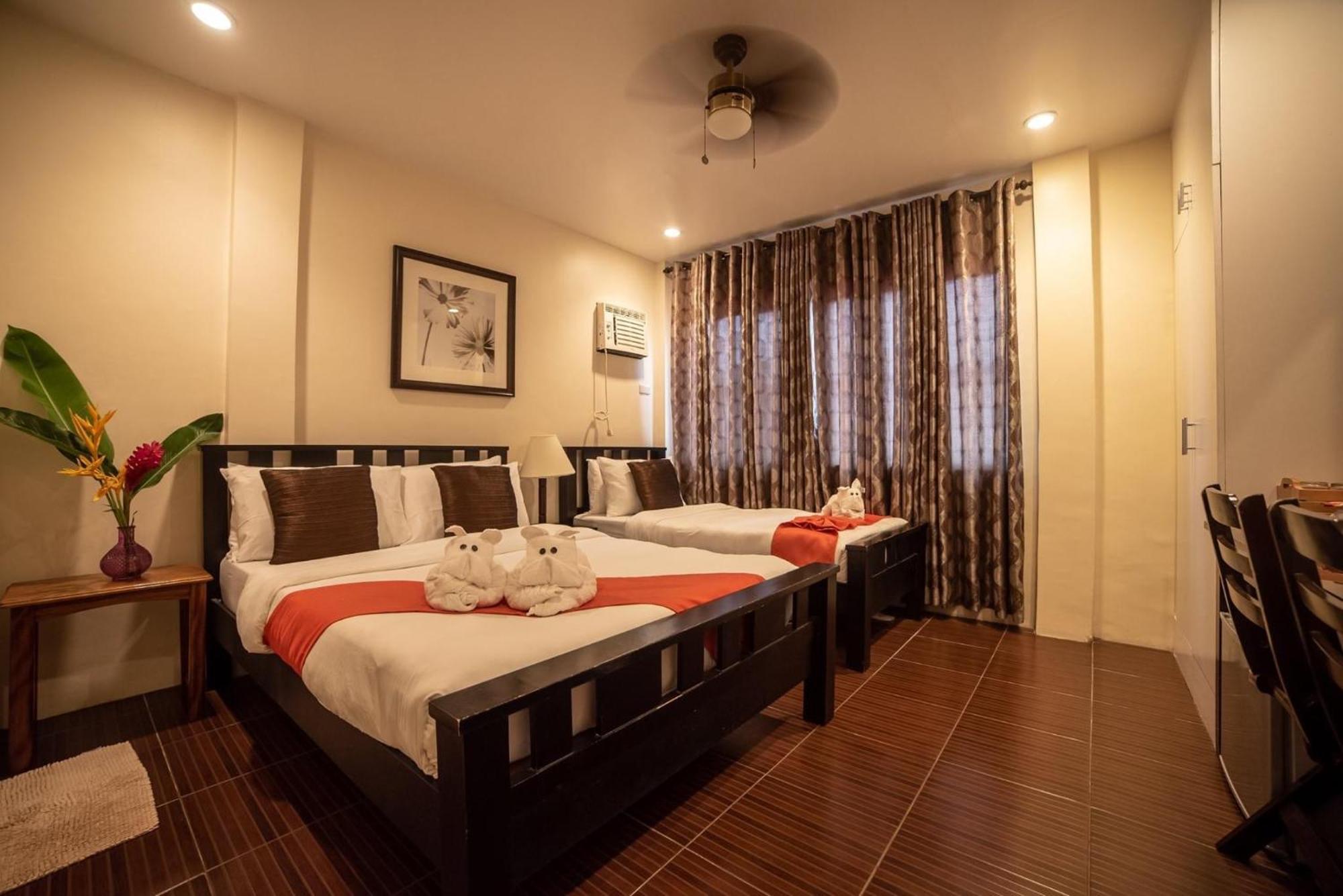 Amboy Hometel Basco Bagian luar foto