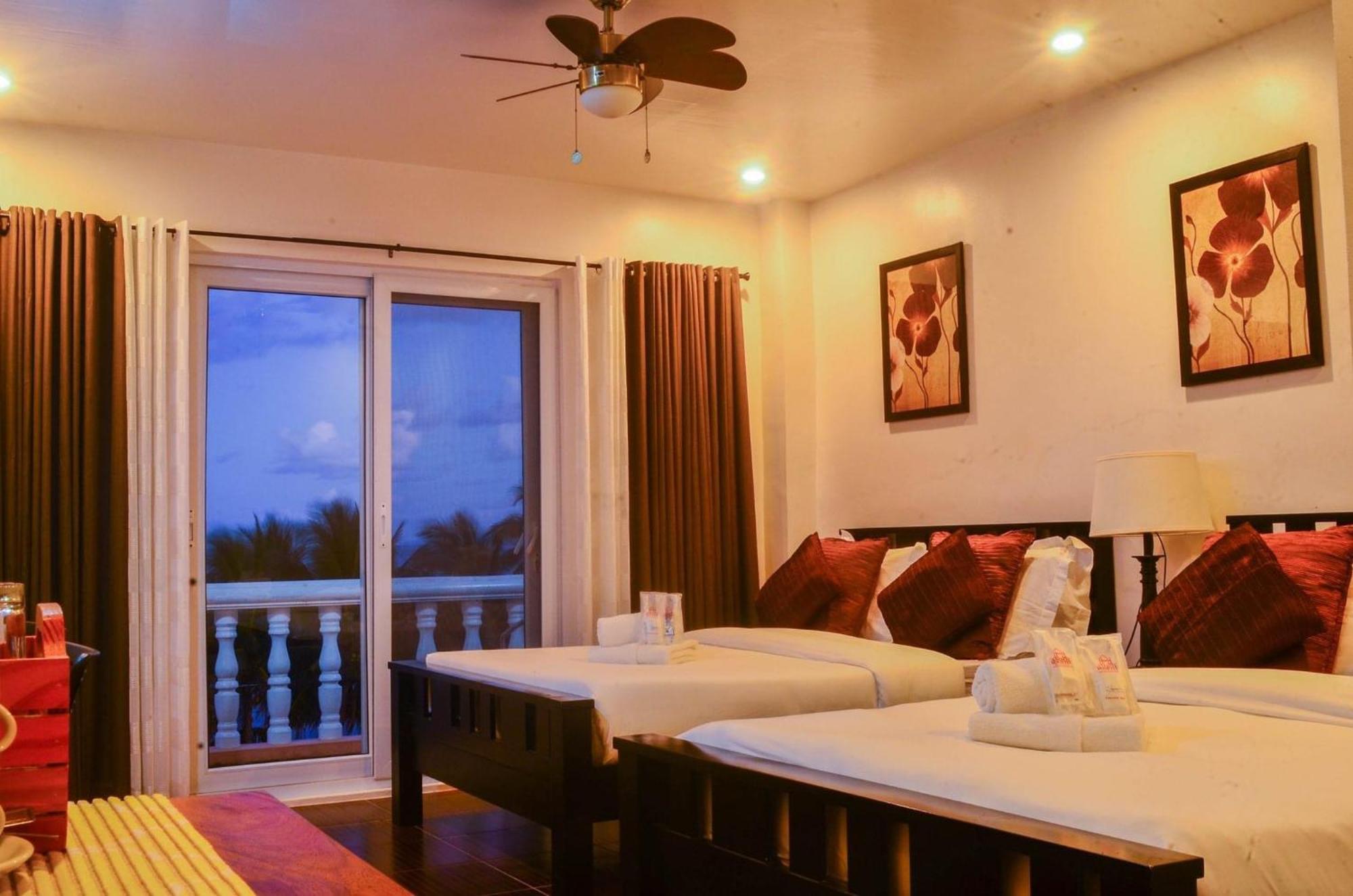 Amboy Hometel Basco Bagian luar foto